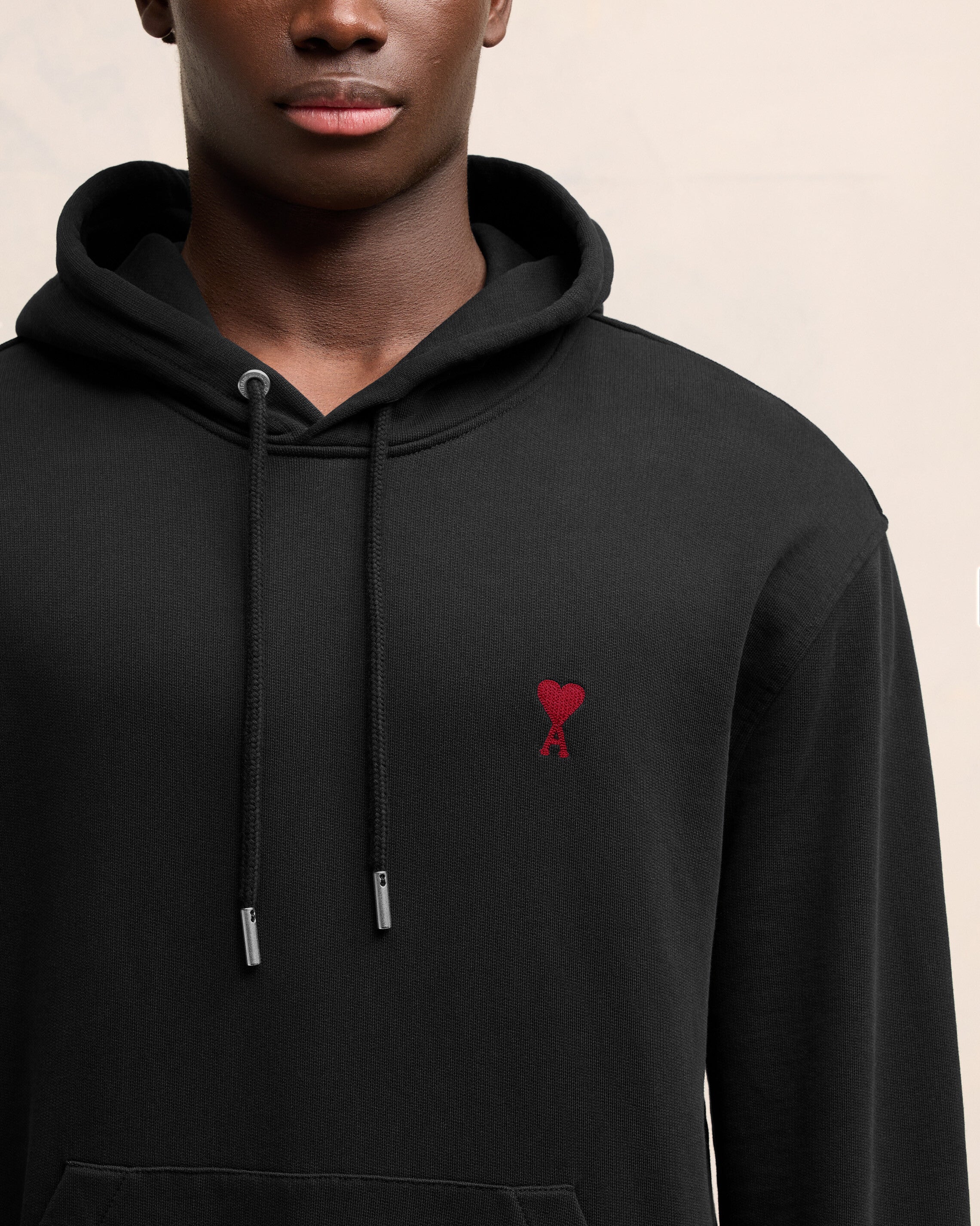 Black hoodie with red heart sale